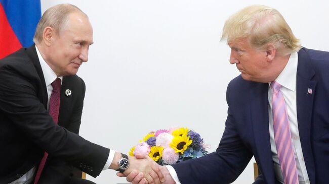 Президент России Владимир Путин и президент США Дональд Трамп